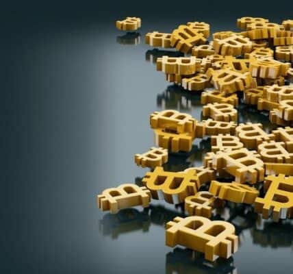 Bitcoin and gold bars rising together on financial charts, symbolizing Bitcoin’s growing status alongside traditional hedge assets amid global market volatility.