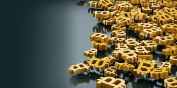 Bitcoin and gold bars rising together on financial charts, symbolizing Bitcoin’s growing status alongside traditional hedge assets amid global market volatility.